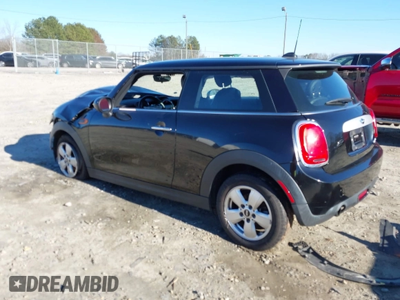 2014 MINI Hardtop with VIN WMWXM5C51ET972099, listed as a IAAI auction lot 41595497 with 113,496 mi miles and . Bid and sale history available at DreamBid. Image 3.