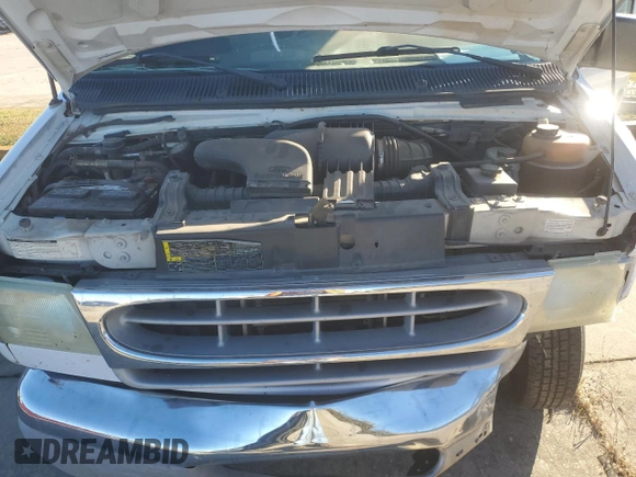 2002 Ford Econoline Passenger XL with VIN 1FBSS31S82HB36096, listed as a Copart auction lot 80654574 with 170,656 mi miles and Salvage title. Bid and sale history available at DreamBid. Image 13.
