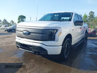 2023 Ford F-150 Lightning Pro with VIN 1FTVW1EL6PWG34059, listed as a IAAI auction lot 42010900 with 20,759 mi miles and . Bid and sale history available at DreamBid. Image 19.