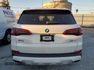 2020 BMW X5 sDrive40i with VIN 5UXCR4C03L9B14243, listed as a Copart auction lot 38179513 with 0 mi miles. Bid and sale history available at carsss.com. Image 6.