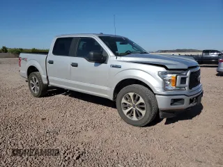 2019 Ford F-150 XL with VIN 1FTEW1EPXKKD82772, listed as a Copart auction lot 61176535 with 121,067 mi miles and Salvage title. Bid and sale history available at DreamBid. Image 4.