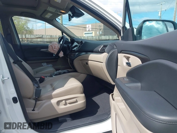 2021 Honda Pilot EX-L with VIN 5FNYF6H57MB054147, listed as a IAAI auction lot 42158910 with 37,811 mi miles and . Bid and sale history available at DreamBid. Image 5.