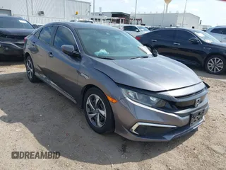 2021 Honda Civic LX with VIN 2HGFC2F62MH556466, listed as a IAAI auction lot 42046753 with 78,687 mi miles and . Bid and sale history available at DreamBid. Image 1.