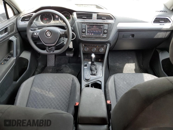 2018 Volkswagen Tiguan S with VIN 3VV0B7AX6JM094609, listed as a Copart auction lot 59550215 with 118,975 mi miles and Salvage title. Bid and sale history available at DreamBid. Image 8.
