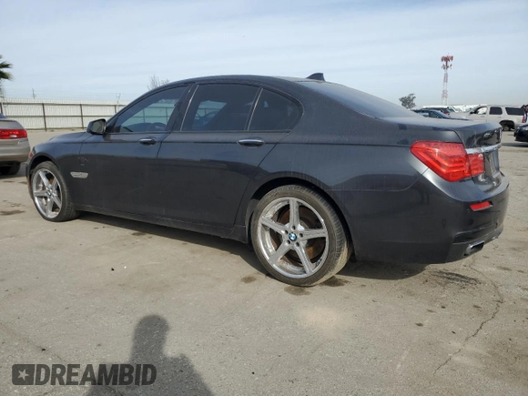 2012 BMW 7 Series 750i with VIN WBAKA8C58CDS99694, listed as a Copart auction lot 46828435 with 131,458 mi miles and Salvage title. Bid and sale history available at DreamBid. Image 2.