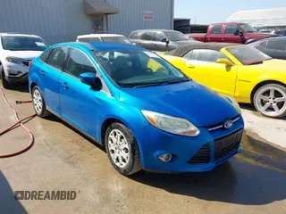 2012 Ford Focus SE with VIN 1FAHP3F24CL415176, listed as a IAAI auction lot 41993864 with 103,805 mi miles. Bid and sale history available at carsss.com. Image 1.