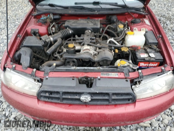 1998 Subaru Legacy L with VIN 4S3BK4350W6308826, listed as a Copart auction lot 71891284 with 134,419 mi miles and Salvage title. Bid and sale history available at DreamBid. Image 12.