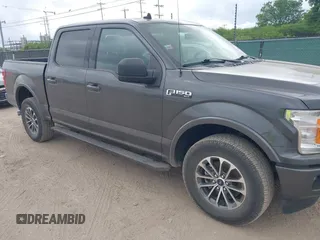 2020 Ford F-150 XL with VIN 1FTEW1E41LKE66857, listed as a IAAI auction lot 42041929 with 76,716 mi miles. Bid and sale history available at carsss.com. Image 1.