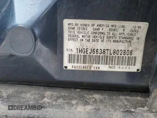 1996 Honda Civic z VIN 1HGEJ6638TL802808, wystawiony jako Copart lot #88307755 z przebiegiem 243 355 mil mil oraz Czysty tytuł • Clean title. Historia ofert i sprzedaży dostępna na DreamBid. Obrazek 13.