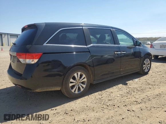2016 Honda Odyssey EX-L with VIN 5FNRL5H69GB072797, listed as a Copart auction lot 50253825 with 200,970 mi miles and Salvage Title. Bid and sale history available at DreamBid. Image 3.