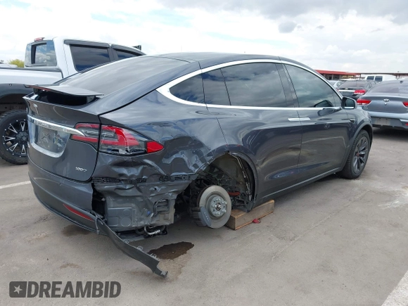 2018 Tesla Model X 75D with VIN 5YJXCBE29JF126629, listed as a IAAI auction lot 42205838 with 47,343 mi miles and . Bid and sale history available at DreamBid. Image 6.