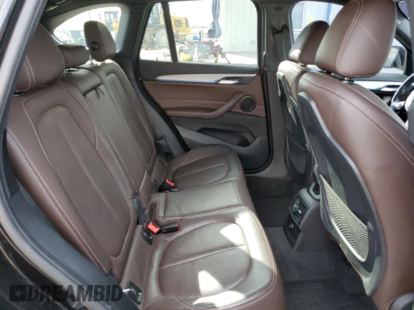2016 BMW X1 xDrive28i with VIN WBXHT3C36G5E53172, listed as a Copart auction lot 48594805 with 69,038 mi miles and Salvage Title. Bid and sale history available at carsss.com. Image 11.