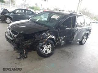 2018 Dodge Grand Caravan SXT with VIN 2C4RDGCG7JR208347, listed as a IAAI auction lot 41354748 with 159,892 mi miles. Bid and sale history available at carsss.com. Image 17.