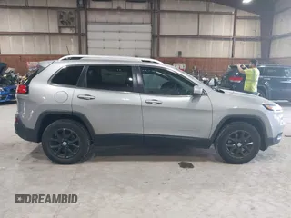 2016 Jeep Cherokee Latitude z VIN 1C4PJMCB9GW148882, wystawiony jako IAAI lot #42210237 z przebiegiem 124 441 mil mil oraz . Historia ofert i sprzedaży dostępna na DreamBid. Obrazek 13.
