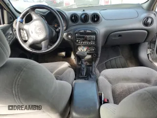 2003 Pontiac Grand Am GT with VIN 1G2NW52E13M707541, listed as a Copart auction lot 41906455 with 218,878 mi miles and Salvage Title. Bid and sale history available at carsss.com. Image 8.