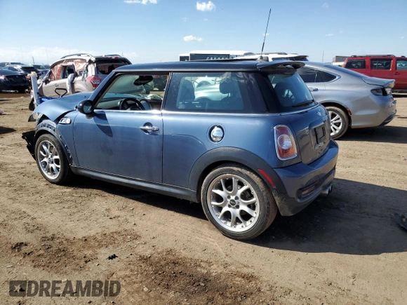 2011 MINI Hardtop S with VIN WMWSV3C57BTY13899, listed as a Copart auction lot 55802555 with 73,012 mi miles and Salvage title. Bid and sale history available at DreamBid. Image 2.