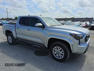 2024 Toyota Tacoma SR5 with VIN 3TMKB5FN8RM002169, listed as a Copart auction lot 60308275 with 5,789 mi miles and Clean title. Bid and sale history available at DreamBid. Image 4.