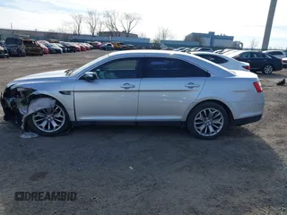 2014 Ford Taurus Limited with VIN 1FAHP2F86EG134779, listed as a IAAI auction lot 41660527 with 115,016 mi miles. Bid and sale history available at carsss.com. Image 14.