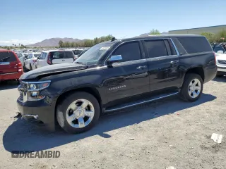 2016 Chevrolet Suburban LTZ with VIN 1GNSKJKC9GR401883, listed as a Copart auction lot 55123325 with 70,812 mi miles and Salvage title. Bid and sale history available at DreamBid. Image 1.