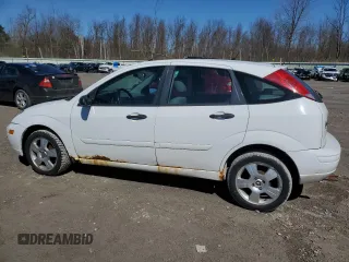 2004 Ford Focus with VIN 3FAFP37Z74R121213, listed as a Copart auction lot 53339645 with 65,590 mi miles and Clean title. Bid and sale history available at DreamBid. Image 2.