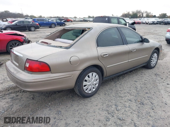 2003 Mercury Sable GS z VIN 1MEFM50U33A606937, wystawiony jako IAAI lot #41058899 z przebiegiem 138 479 mil mil oraz . Historia ofert i sprzedaży dostępna na DreamBid. Obrazek 4.