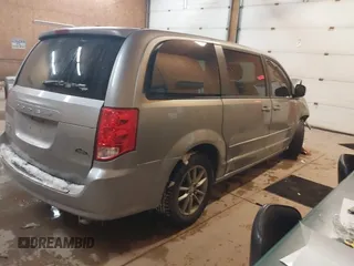 2015 Dodge Grand Caravan SE with VIN 2C4RDGBG1FR738659, listed as a IAAI auction lot 41547350 with 96,621 mi miles and . Bid and sale history available at DreamBid. Image 4.