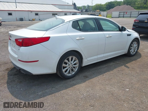 2015 Kia Optima LX with VIN 5XXGM4A71FG356034, listed as a IAAI auction lot 42402142 with 131,376 mi miles and . Bid and sale history available at DreamBid. Image 4.