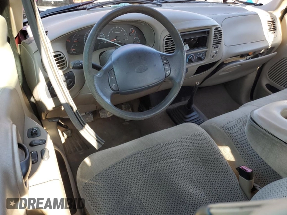 2000 Ford F-150 XL with VIN 1FTZX1728YNA87502, listed as a Copart auction lot 54870295 with 219,971 mi miles and Salvage title. Bid and sale history available at DreamBid. Image 8.