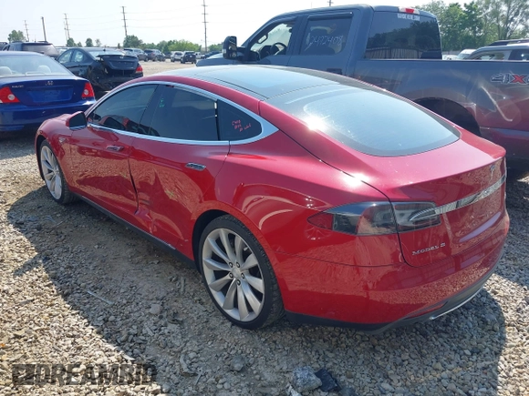 2013 Tesla Model S Performance with VIN 5YJSA1CP6DFP17689, listed as a IAAI auction lot 42483390 with 51,432 mi miles and . Bid and sale history available at DreamBid. Image 3.