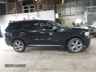 2012 Dodge Durango Citadel z VIN 1C4SDJET7CC247699, wystawiony jako IAAI lot #42225474 z przebiegiem 192 155 mil mil oraz . Historia ofert i sprzedaży dostępna na DreamBid. Obrazek 13.