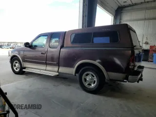 2001 Ford F-150 XL with VIN 1FTRX17W71NA45086, listed as a Copart auction lot 54182945 with 173,998 mi miles and Salvage title. Bid and sale history available at DreamBid. Image 2.