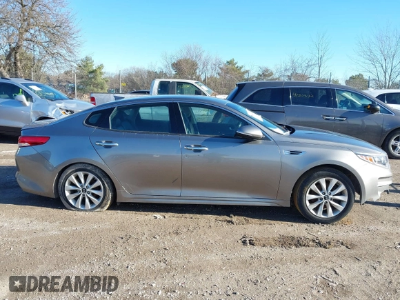 2016 Kia Optima EX with VIN 5XXGU4L36GG098749, listed as a IAAI auction lot 41191912 with 113,019 mi miles and . Bid and sale history available at DreamBid. Image 13.