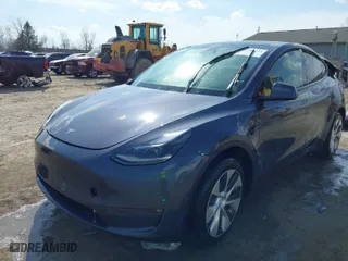 2023 Tesla Model Y Long Range with VIN 7SAYGDEE7PF755980, listed as a IAAI auction lot 41781433 with 31,427 mi miles. Bid and sale history available at carsss.com. Image 2.