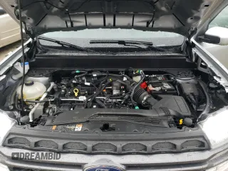 2023 Ford Maverick XL with VIN 3FTTW8F92PRA20907, listed as a Copart auction lot 58178395 with 23,585 mi miles and Salvage title. Bid and sale history available at DreamBid. Image 11.