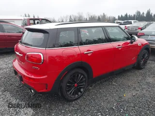 2019 MINI Clubman Cooper S with VIN WMWLU5C52K2G03545, listed as a IAAI auction lot 41279158 with 56,875 mi miles. Bid and sale history available at carsss.com. Image 4.