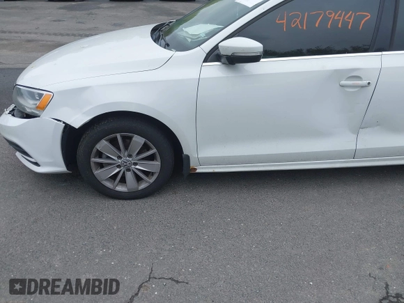 2015 Volkswagen Jetta SE with VIN 3VWD17AJ5FM305415, listed as a IAAI auction lot 42179447 with 154,535 mi miles and . Bid and sale history available at DreamBid. Image 12.
