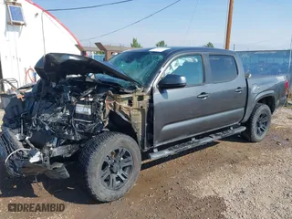 2019 Toyota Tacoma 4WD SR with VIN 3TMCZ5AN3KM268342, listed as a IAAI auction lot 40265512 with 66,789 mi miles. Bid and sale history available at carsss.com. Image 18.