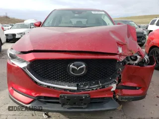 2021 Mazda CX-5 Grand Touring Reserve with VIN JM3KFBAY4M0358478, listed as a Copart auction lot 50839815 with 84,932 mi miles and Salvage Title. Bid and sale history available at DreamBid. Image 5.