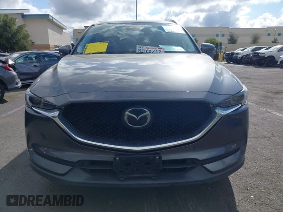 2021 Mazda CX-5 Grand Touring with VIN JM3KFADM2M1340669, listed as a IAAI auction lot 41916687 with 83,872 mi miles. Bid and sale history available at carsss.com. Image 13.