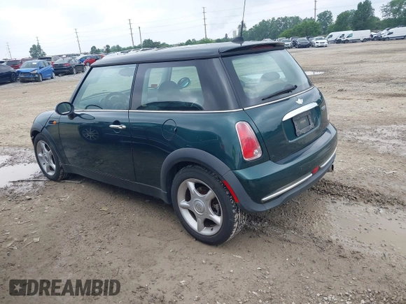 2006 MINI Hardtop with VIN WMWRC33566TK67977, listed as a IAAI auction lot 42538539 with 121,650 mi miles and . Bid and sale history available at DreamBid. Image 3.