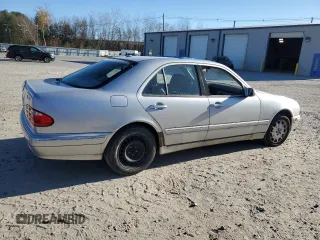2001 Mercedes-Benz E-Class AWD with VIN WDBJF82J81X059893, listed as a Copart auction lot 80285554 with 156,713 mi miles and Clean Title. Bid and sale history available at carsss.com. Image 3.