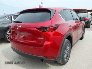 2017 Mazda CX-5 Touring with VIN JM3KFACL2H0197985, listed as a IAAI auction lot 42069182 with 184,734 mi miles. Bid and sale history available at carsss.com. Image 4.