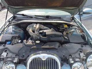 2004 Jaguar S-Type z VIN SAJEA01T64FN07825, wystawiony jako IAAI lot #42403796 z przebiegiem 133 011 mil mil oraz . Historia ofert i sprzedaży dostępna na DreamBid. Obrazek 10.
