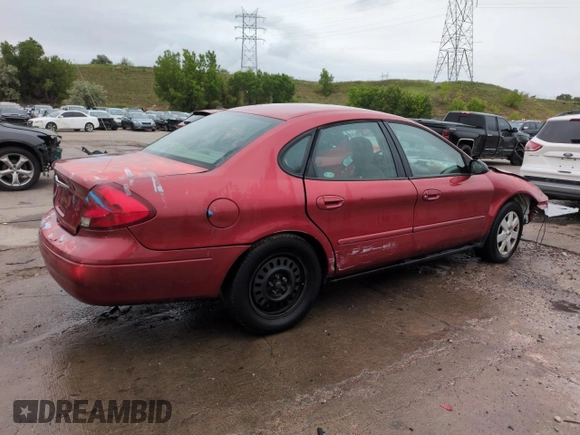 2001 Ford Taurus LX with VIN 1FAFP52UX1A176008, listed as a Copart auction lot 58983935 with 123,985 mi miles and Salvage title. Bid and sale history available at DreamBid. Image 3.