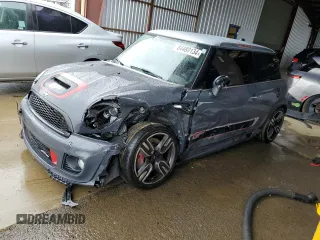 2013 MINI Hardtop John Cooper Works with VIN WMWSU9C56DT385140, listed as a Copart auction lot 84480134 with 83,420 mi miles and Salvage title. Bid and sale history available at DreamBid. Image 1.