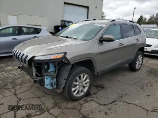 2017 Jeep Cherokee Limited with VIN 1C4PJMDSXHW633757, listed as a Copart auction lot 52146435 with 104,066 mi miles and Salvage Title. Bid and sale history available at DreamBid. Image 1.