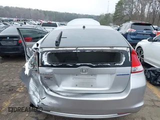 2010 Honda Insight EX with VIN JHMZE2H77AS022538, listed as a IAAI auction lot 41804579 with 184,000 mi miles and . Bid and sale history available at DreamBid. Image 15.
