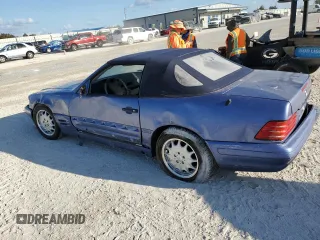 1997 Mercedes-Benz SL-Class with VIN WDBFA63F1VF152883, listed as a Copart auction lot 77570524 with 0 mi miles and Salvage Title. Bid and sale history available at carsss.com. Image 2.