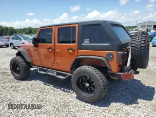 2011 Jeep Wrangler Unlimited Rubicon with VIN 1J4HA6H12BL584493, listed as a Copart auction lot 61765735 with 151,175 mi miles and Salvage title. Bid and sale history available at DreamBid. Image 2.