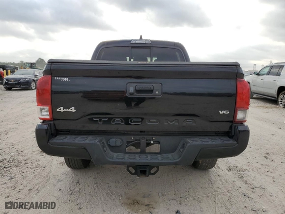 2022 Toyota Tacoma 4WD SR with VIN 3TMCZ5AN9NM458876, listed as a Copart auction lot 53727005 with 40,482 mi miles and Salvage Title. Bid and sale history available at carsss.com. Image 6.